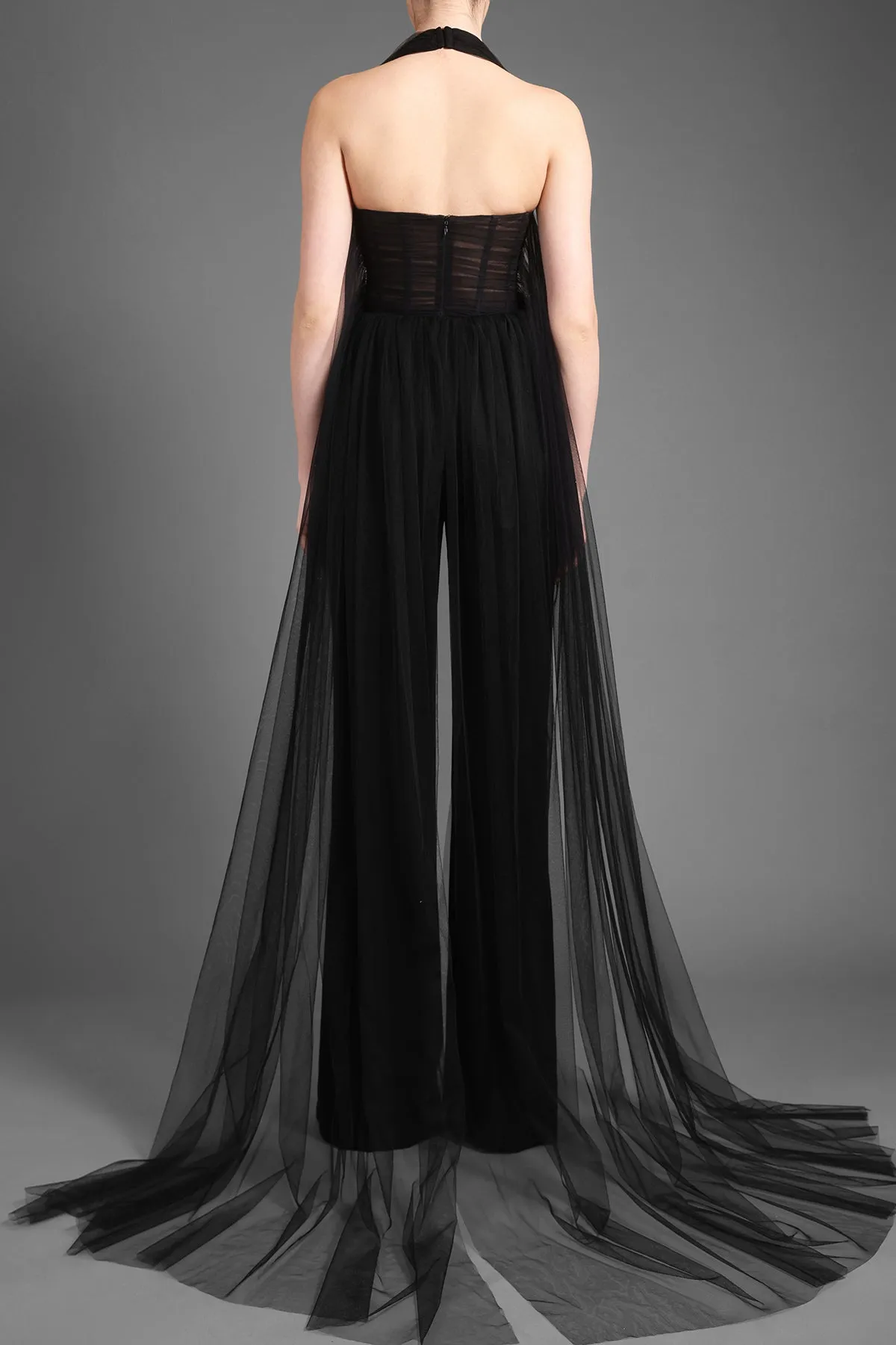 Black jumpsuit with a tulle draped corset and structured crêpe pants